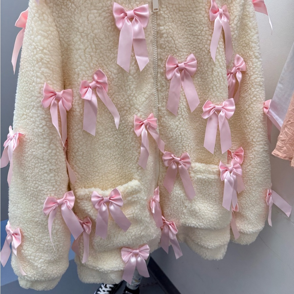 Dolls Kill Cream Sherpa Jacket with Pink Ribbon Bows